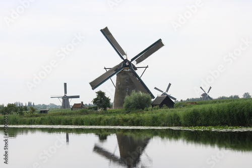 A beautiful, old, historic windmill, with four wings