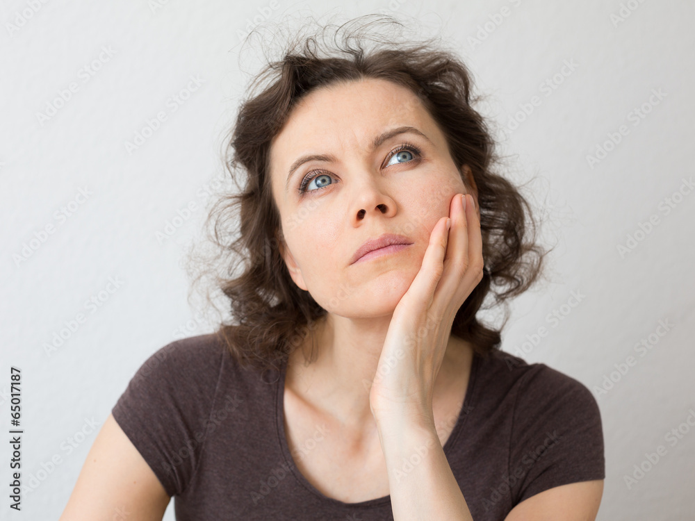 Woman thinking about seriously Woman thinking about seriously