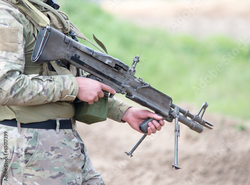 soldier with heavy machine gun