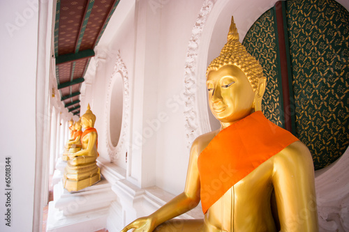 gold buddha temple in Thailand photo