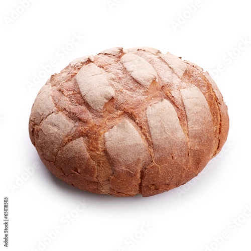 Big fresh homemade bread isolated on white background