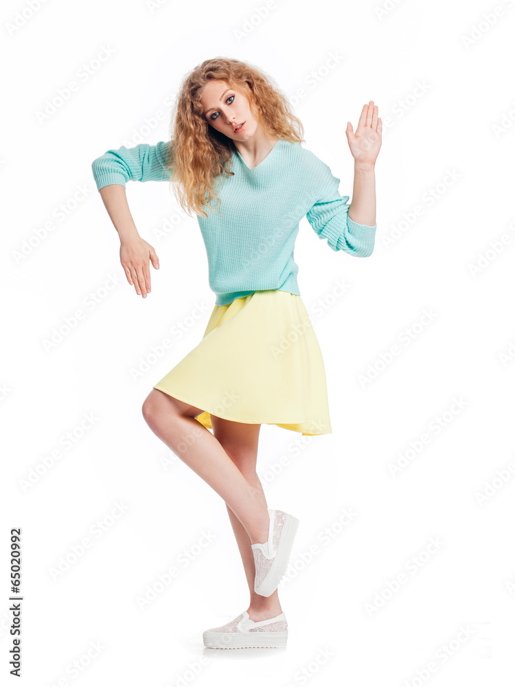 Fototapeta premium Beutiful girl in color dress. Fashion photo. Isolated on white b