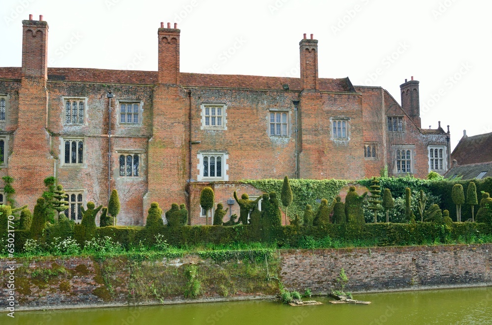 View of english house and hedge
