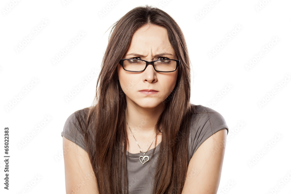frowning woman with glasses