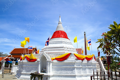 White pagoda against blue sky at Wat Poramaiyikawas Temple in No photo