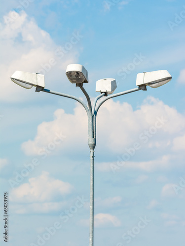 Street Light On Blue Sky With White Clouds photo