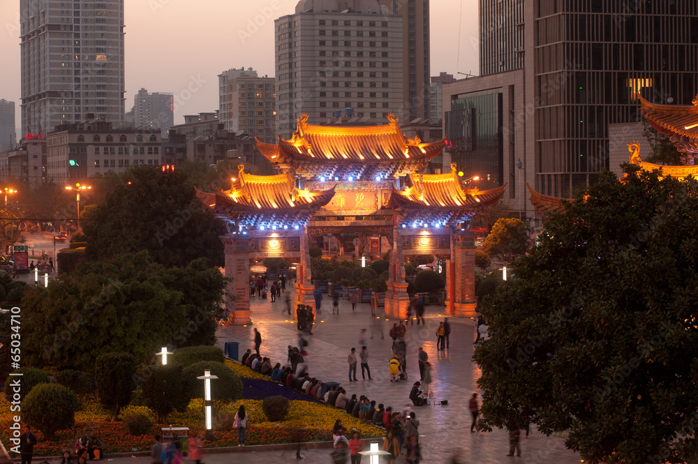Naklejka premium Night scene of Jinma Biji Historic site in Kunming,China.