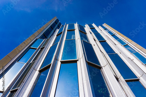 glass silhouettes on modern building