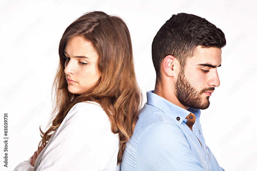 Young mixed-race couple having ralationship problems isolated on Young mixed-race couple having ralationship problems isolated on