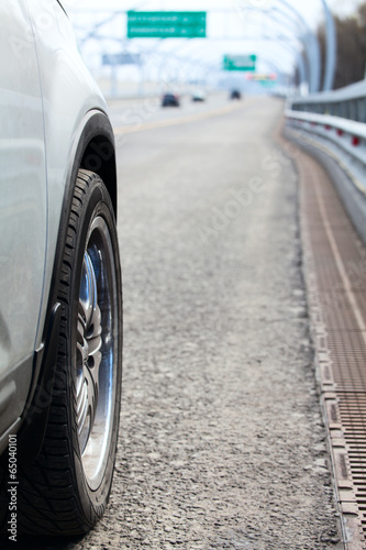 Vehicle side view standing on highway route © Kekyalyaynen