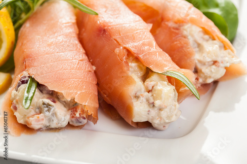 Smoked salmon roll with vegetable salad