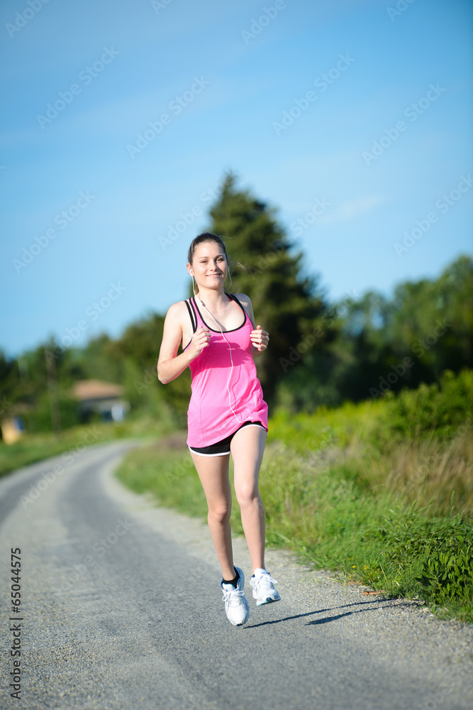 fitness sport healthy cheerful young woman running outdoor