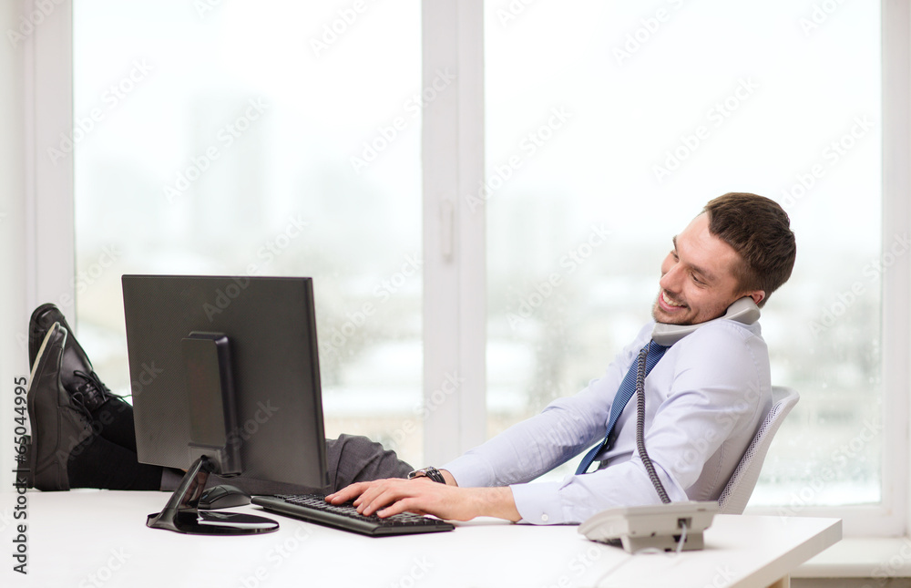 smiling businessman or student with computer smiling businessman or student with computer