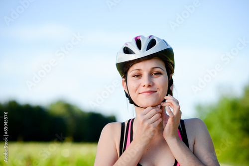 healthy young woman riding bicycle outdoor in the country © W PRODUCTION