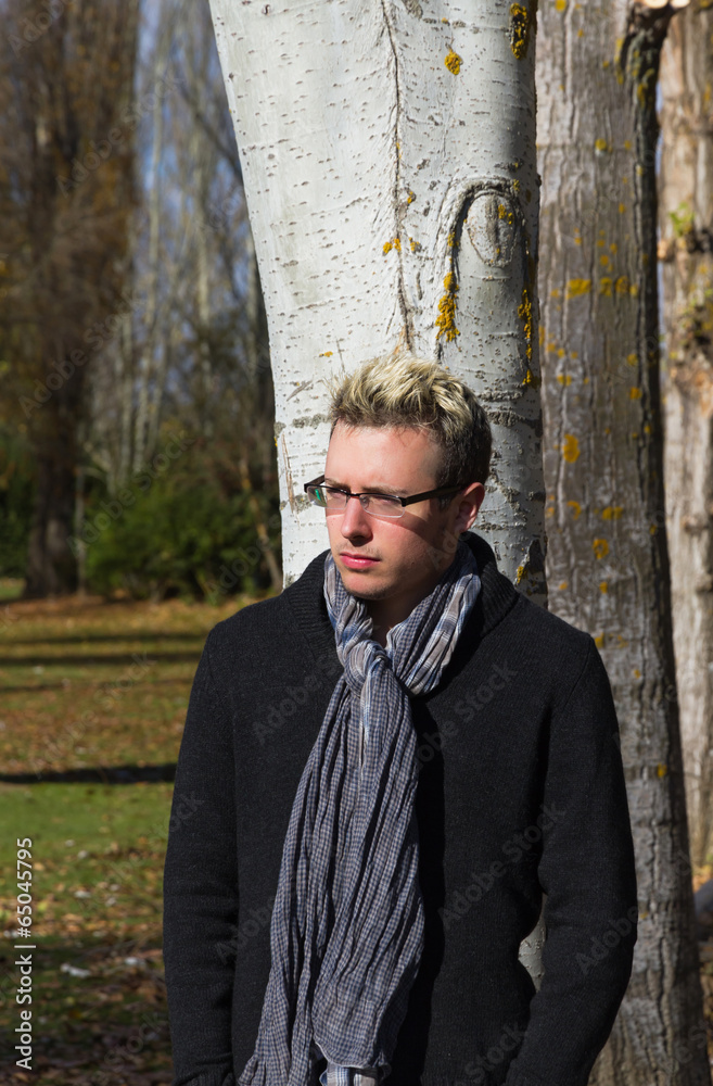 Young Man with Glasses in Nature Young Man with Glasses in Nature