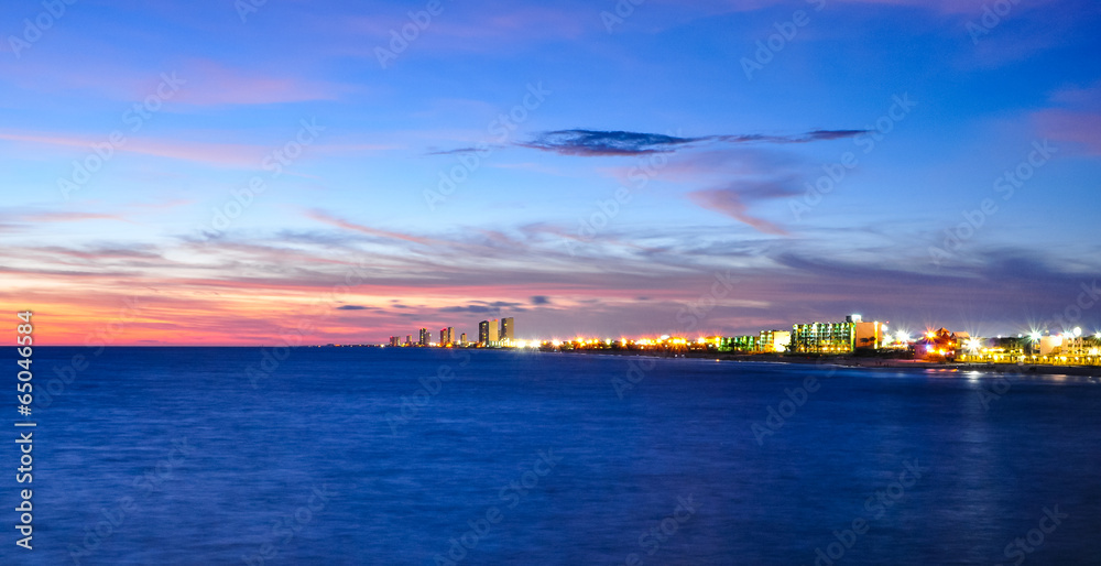 coastal skyline of panama city, florida at dusk coastal skyline of panama city, florida at dusk