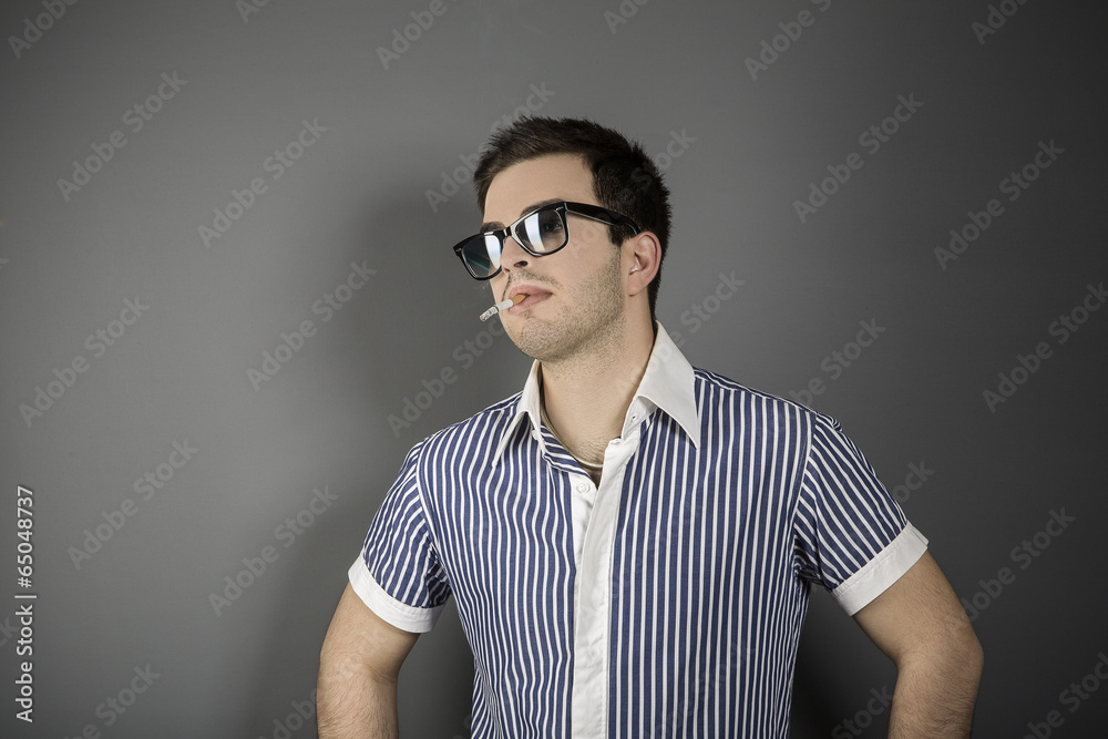Portrait of beauty young man smoking cigarette Portrait of beauty young man smoking cigarette