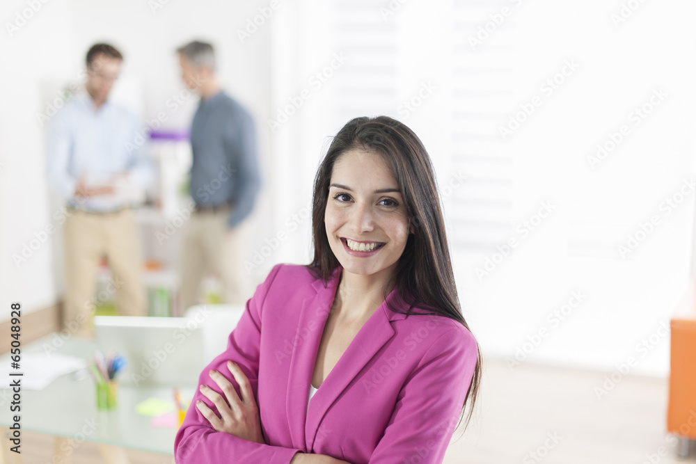Obraz premium Portrait of a smiling businesswoman in meeting