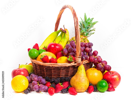 Variety of fresh fruits in wicker basket