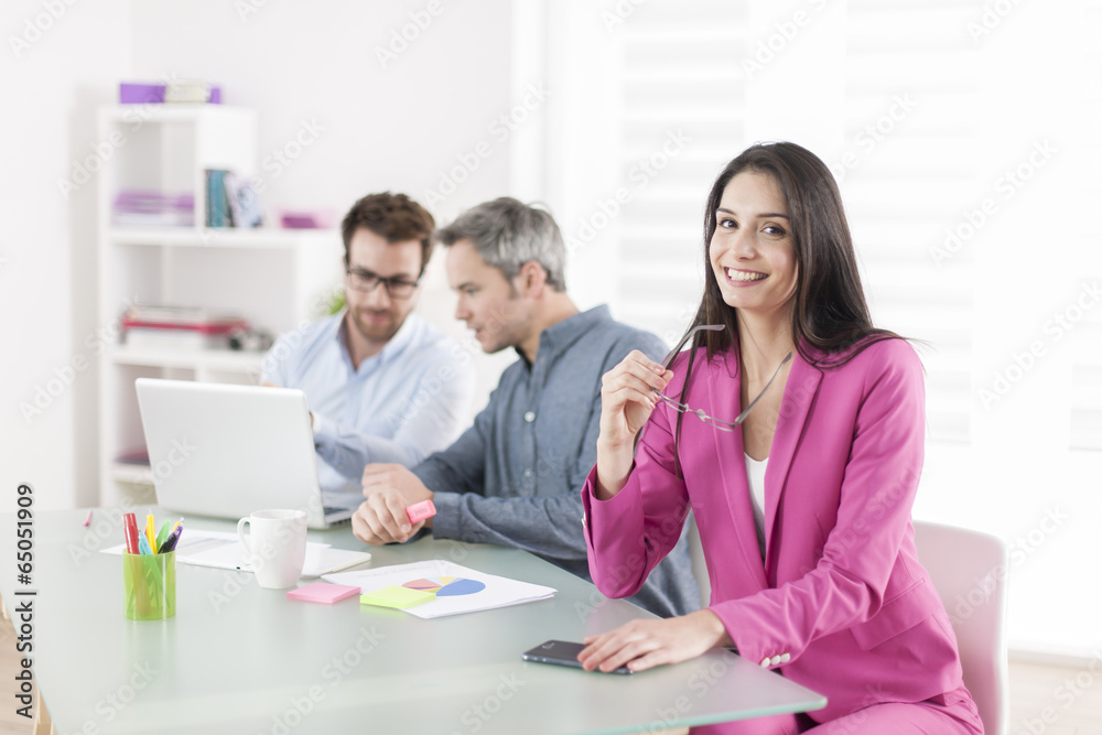 Portrait of a smiling businesswoman in meeting Portrait of a smiling businesswoman in meeting