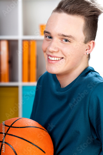 Teenager with basketball
