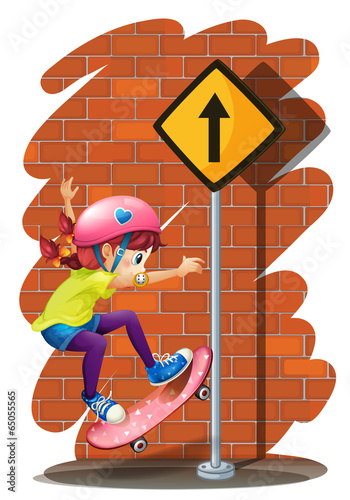 A girl skateboarding near the signboard