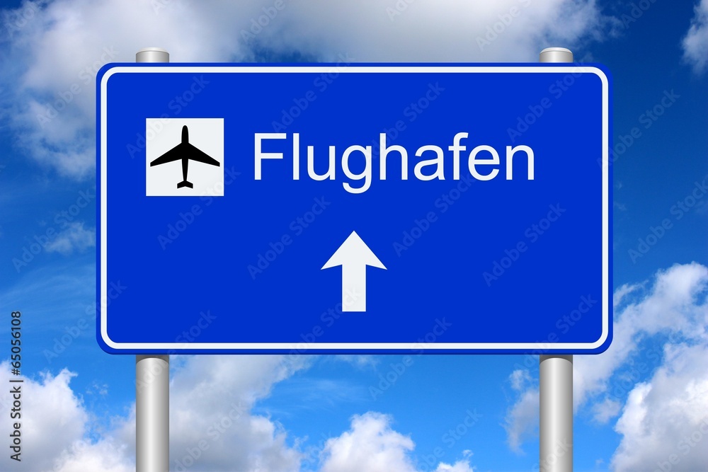 Schild Richtung Flughafen mit Sommerhimmel Schild Richtung Flughafen mit Sommerhimmel