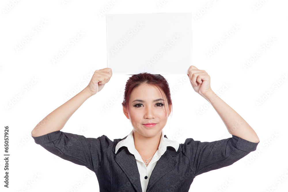 Asian businesswoman show a blank sign over her head Asian businesswoman show a blank sign over her head
