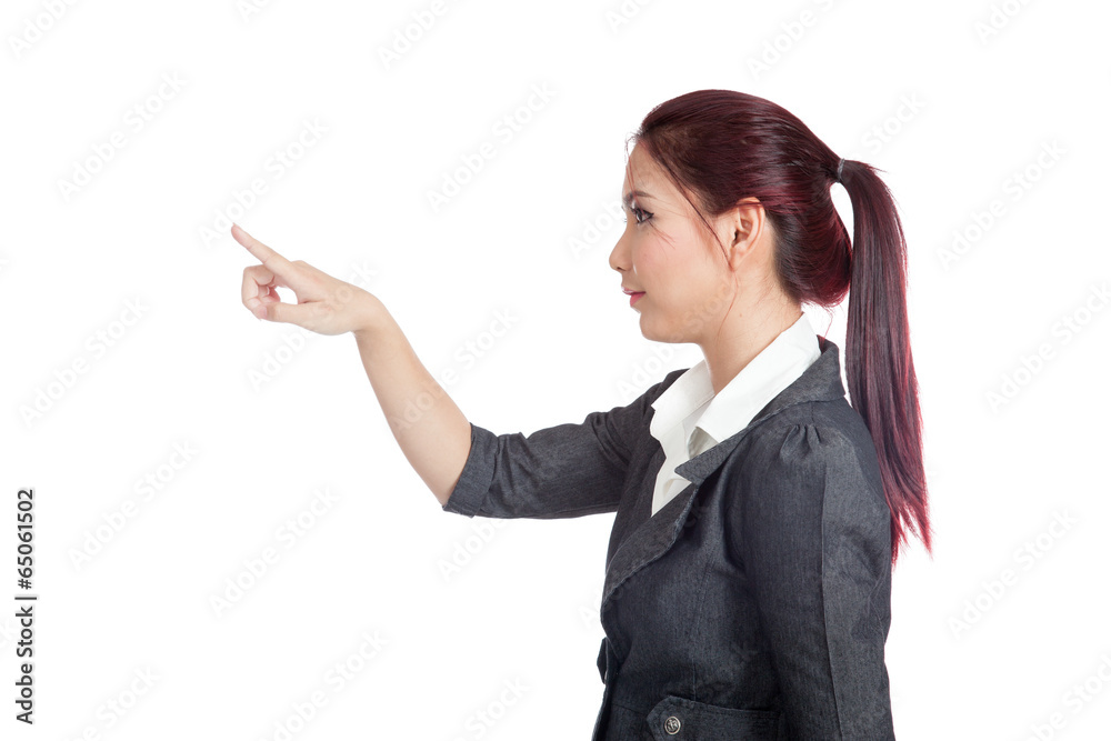 Side view of Asian business woman touching the screen Side view of Asian business woman touching the screen