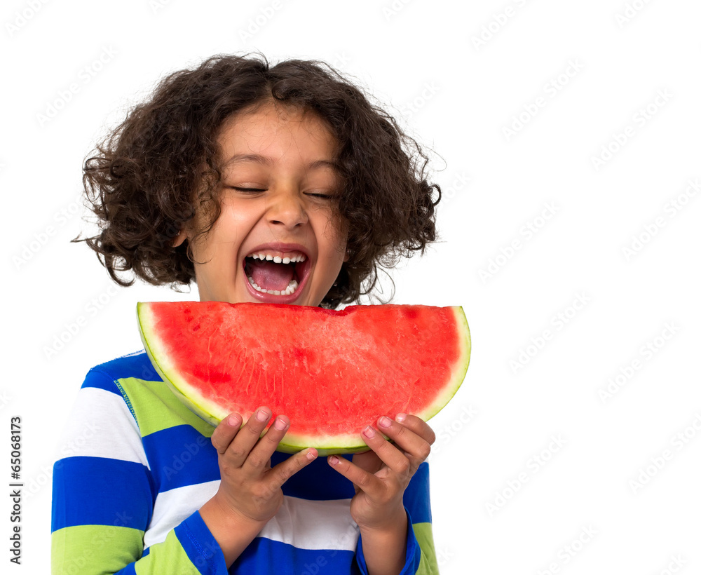 Little girl eating watermelon