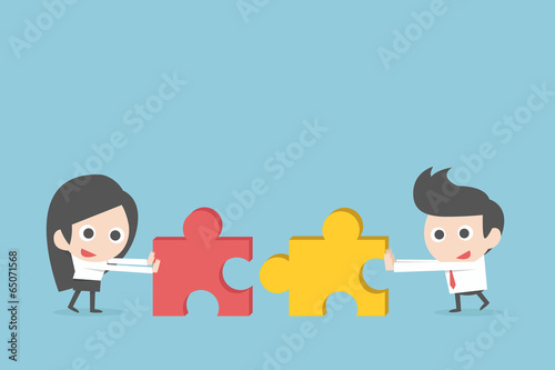 Business teamwork with jigsaw