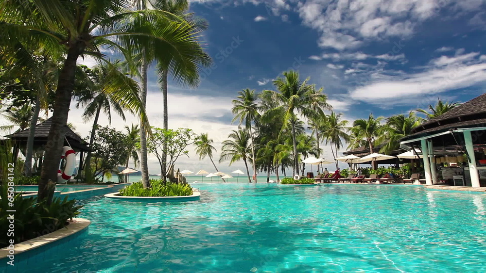 Tropical resort with swimming pool and ocean view Tropical resort with swimming pool and ocean view