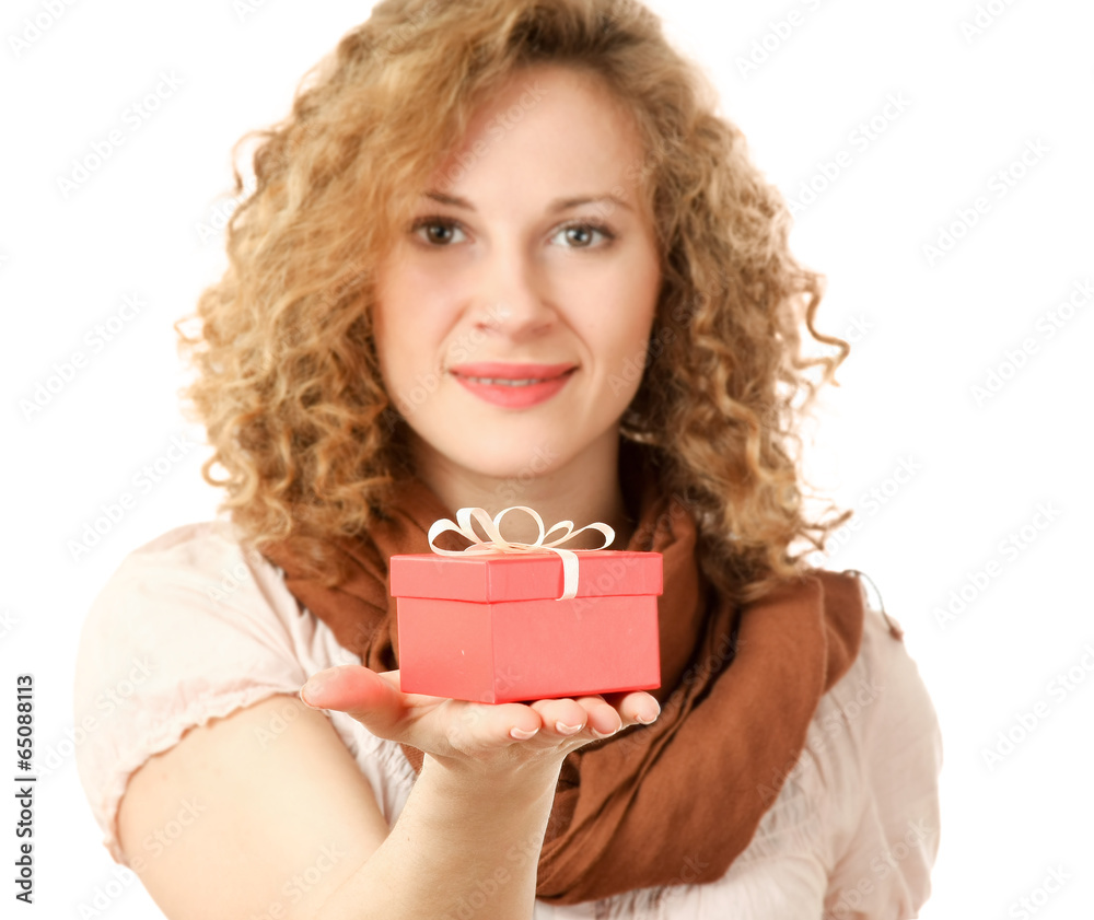 Beautiful surprised woman holding gift with ribbon Beautiful surprised woman holding gift with ribbon