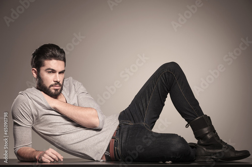 young man resting on the floor