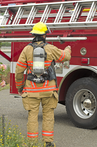 Lowering the ladder rack on a Roseburg fire engine at a drill