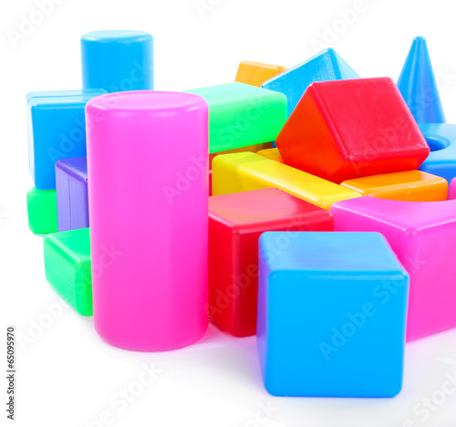 Colorful plastic toys isolated on white