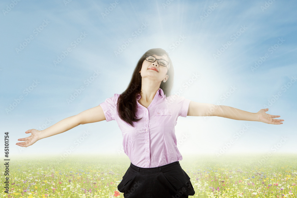 Carefree woman enjoying freedom outdoors Carefree woman enjoying freedom outdoors