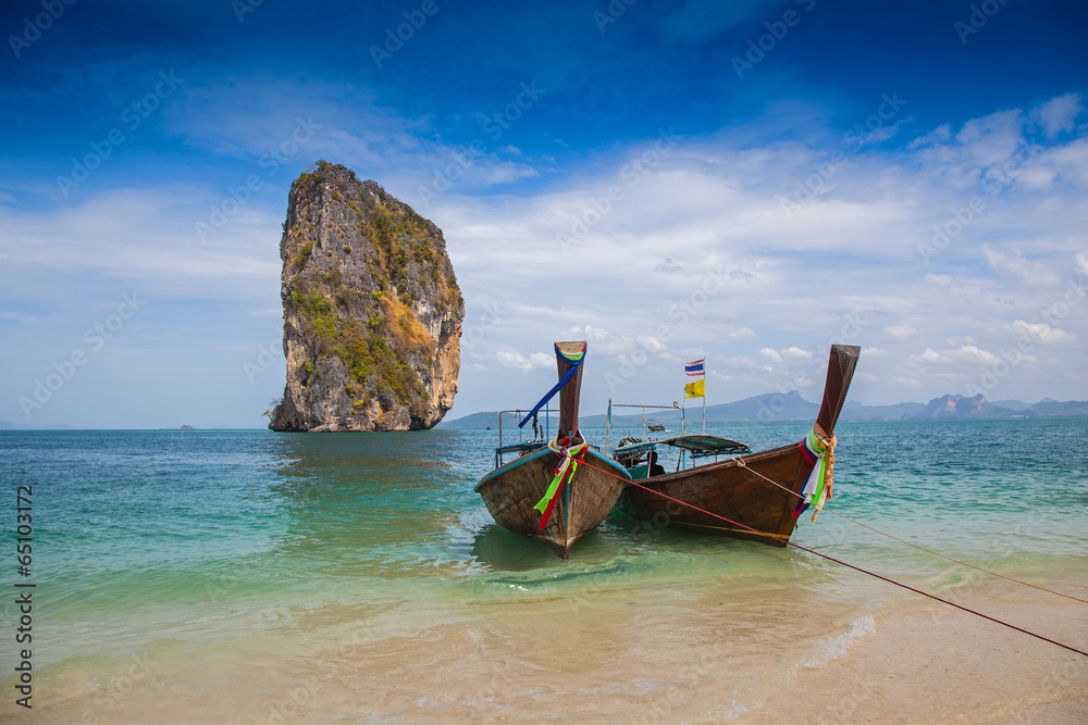 Tropical beach, traditional long tail boats Tropical beach, traditional long tail boats