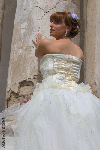 beautiful bride near the old church