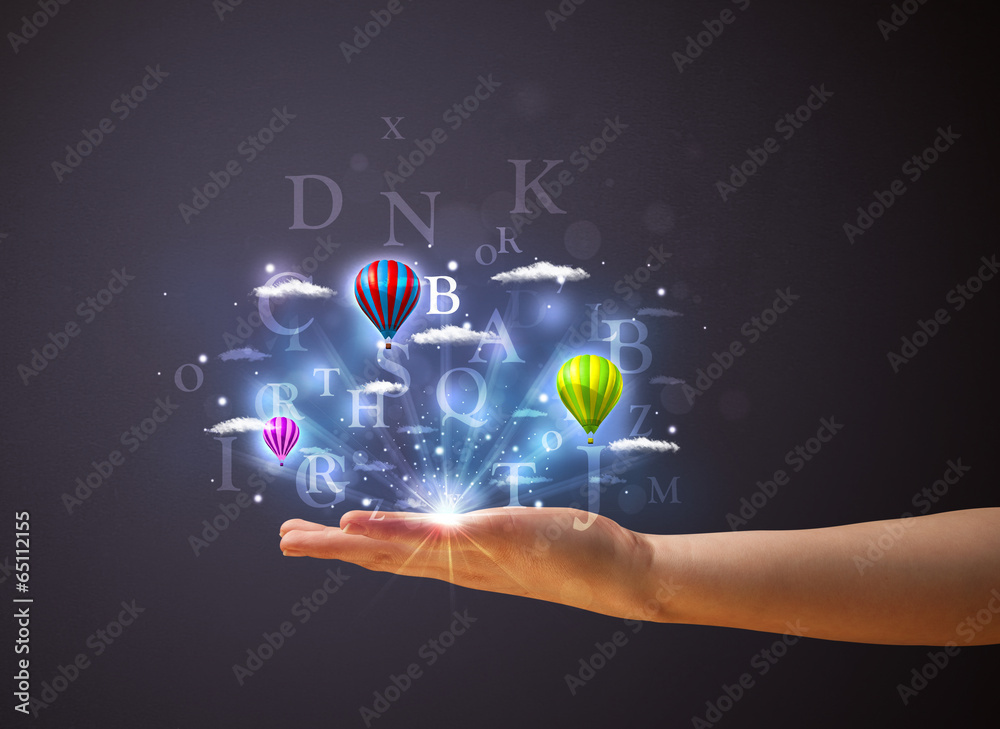 Fototapeta premium Letters and balloons in the hand of a woman