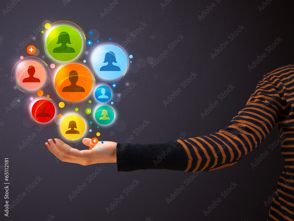 Fototapeta premium Social network icons in the hand of a woman