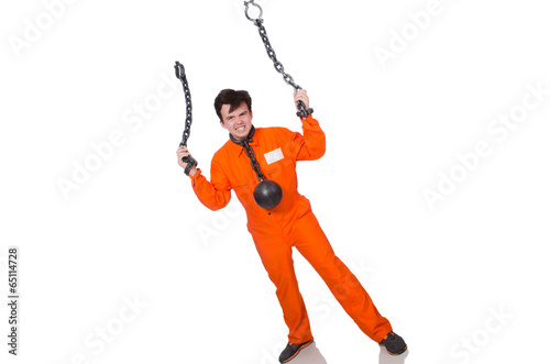 Young inmate with chains isolated on the white