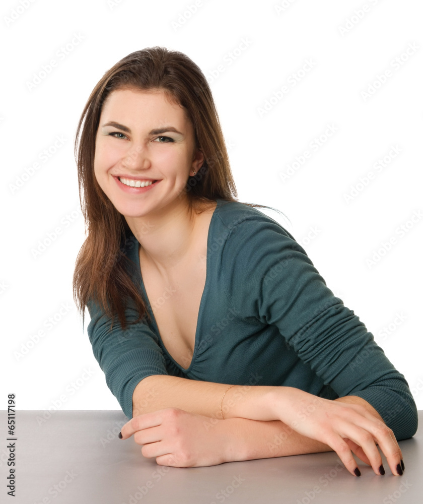 A young woman sitting isolated on white background A young woman sitting isolated on white background