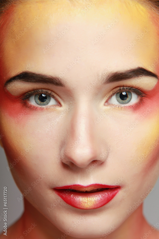 beautiful make up of bright lips, isolated on grey background beautiful make up of bright lips, isolated on grey background