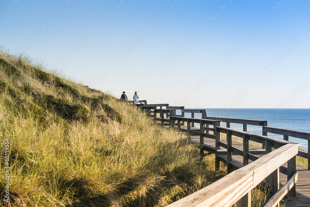 Footpath on dune on Sylt. Entrance for the beach.