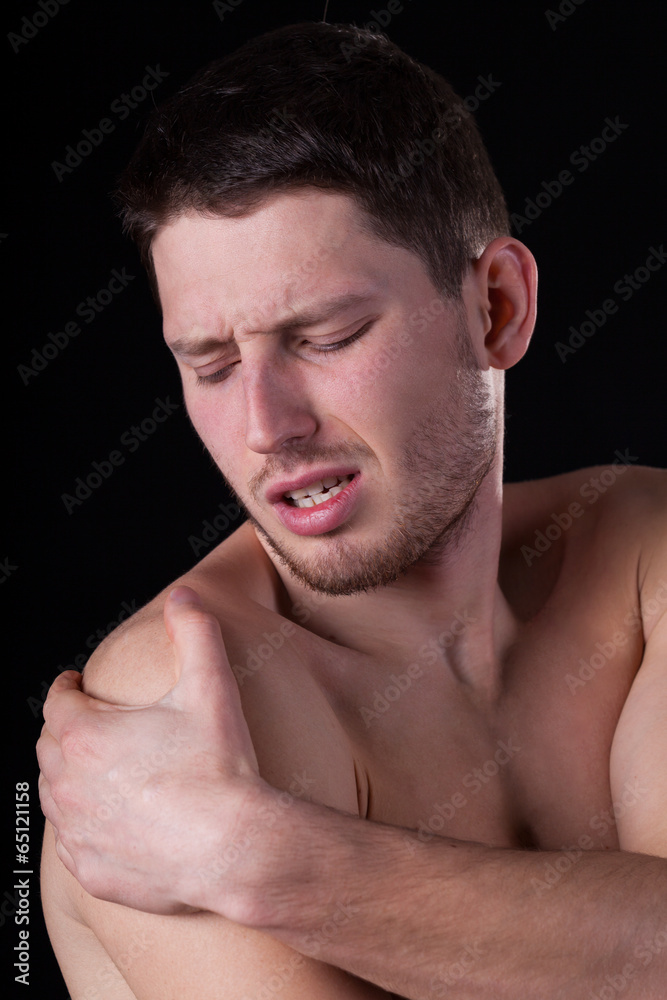 Man having arm pain Man having arm pain