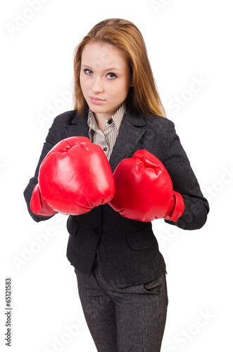 Woman businesswoman with boxing gloves on white © Elnur