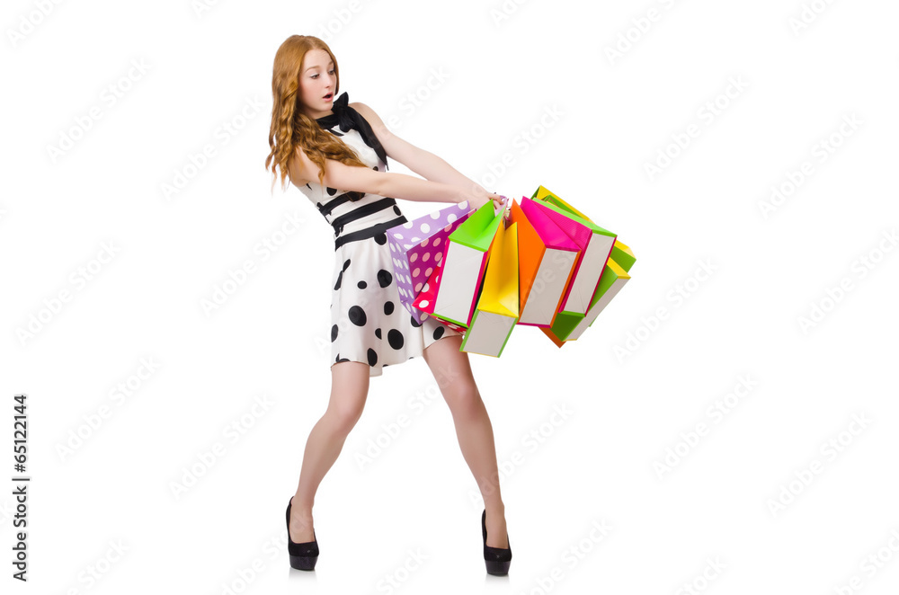 Young woman with shopping bags on white Young woman with shopping bags on white