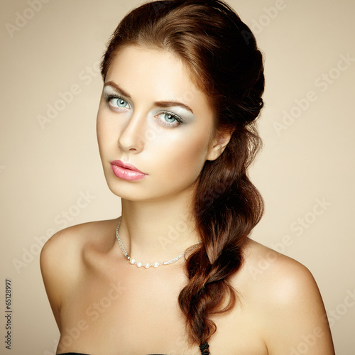Glamour portrait of beautiful woman model with bright makeup and