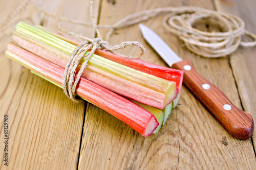 Rhubarb with coil of rope and knife on board